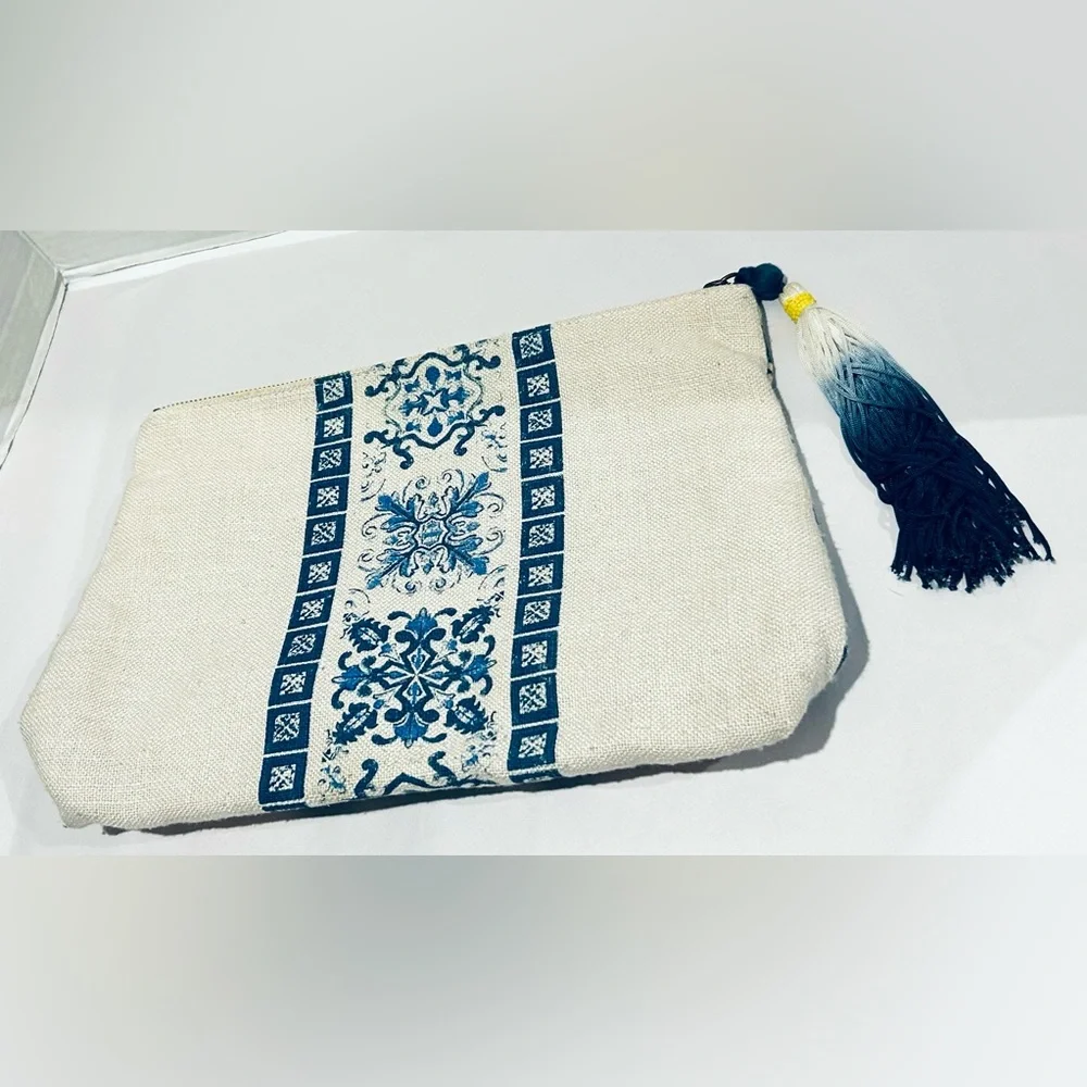Artsy oversized tasseled anthropology clutch purse zipper closure